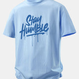 Bavlnené tričko s voľným strihom a potlačou Stay Humble