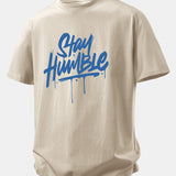 Bavlnené tričko s voľným strihom a potlačou Stay Humble