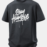 Bavlnené tričko s voľným strihom a potlačou Stay Humble