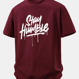 Bavlnené tričko s voľným strihom a potlačou Stay Humble