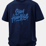 Bavlnené tričko s voľným strihom a potlačou Stay Humble