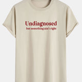 T-shirt z bavlny s potlačou a oblúkovým lemom "Nediagnostikovaná"
