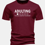 Bavlnené tričko s potlačou "Adulting", klasický strih